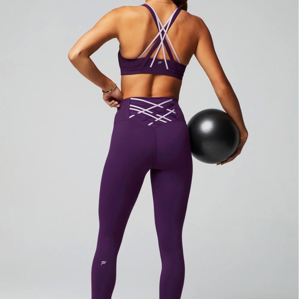 Fabletics Sports Bra and High-Waisted 7/8 Legging in purple - size small
